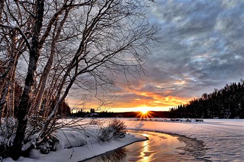 Frozen stream with sunrise